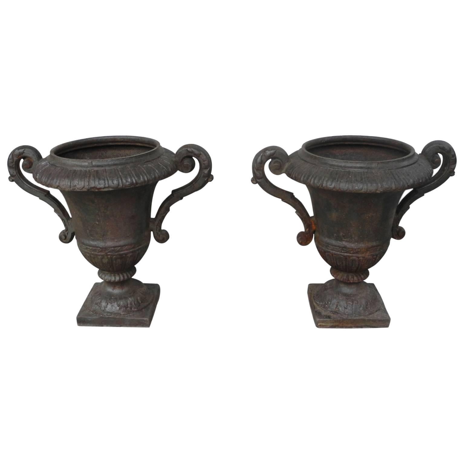 Pair of Antique Iron Urns with Detailing & Carved Arms from 19th Century France For Sale