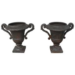Pair of Antique Iron Urns with Detailing & Carved Arms from 19th Century France