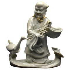 China, 18th Century, Chinese white porcelain group representing the god Shoulao