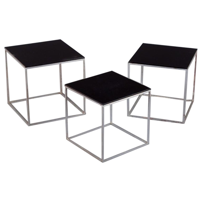 Poul Kjærholm, Danish furniture designer. Set of nesting tables PK 71. 