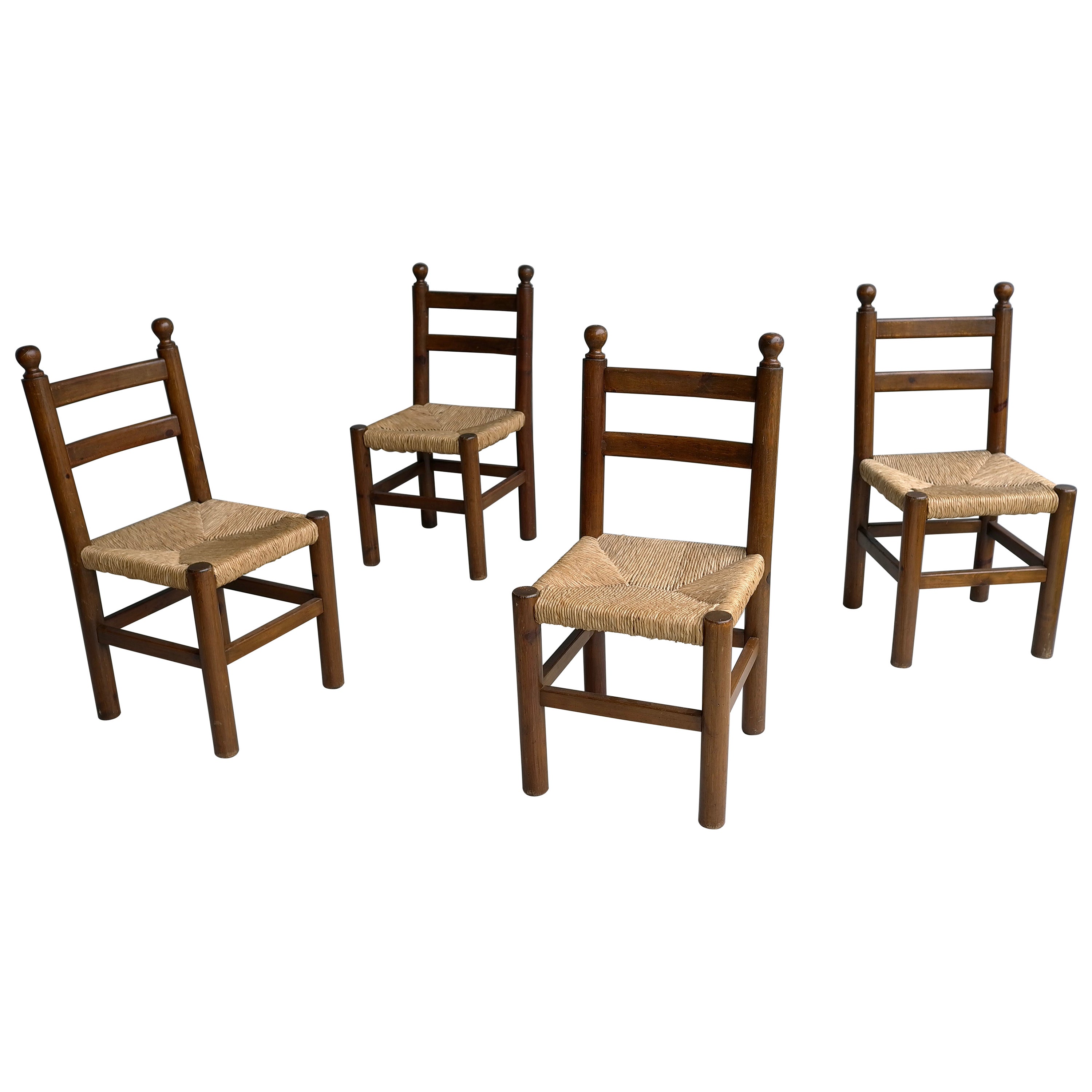 Four Solid Pine dining room chairs wit Rush seats in Style of Charles Dudouyt For Sale