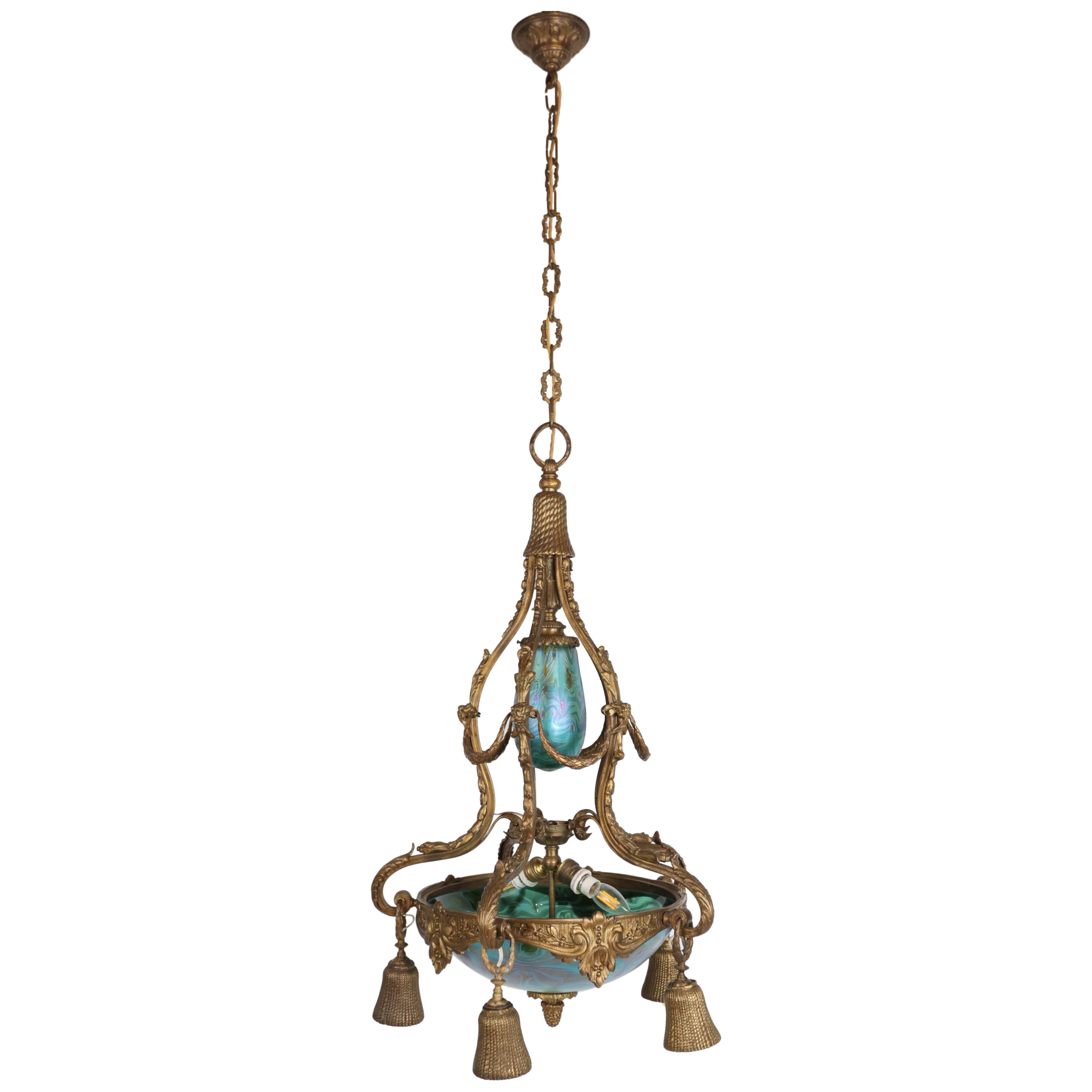 Art Nouveau bronze chandelier with iridescent glass shades For Sale