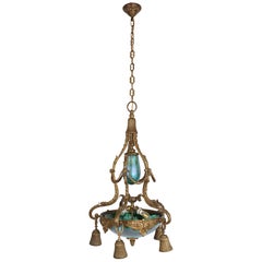 Antique Art Nouveau bronze chandelier with iridescent glass shades