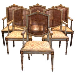 Fin du 18e siècle - Ensemble de 6 chaises à accoudoirs peintes et dorées au parchemin, italiennes