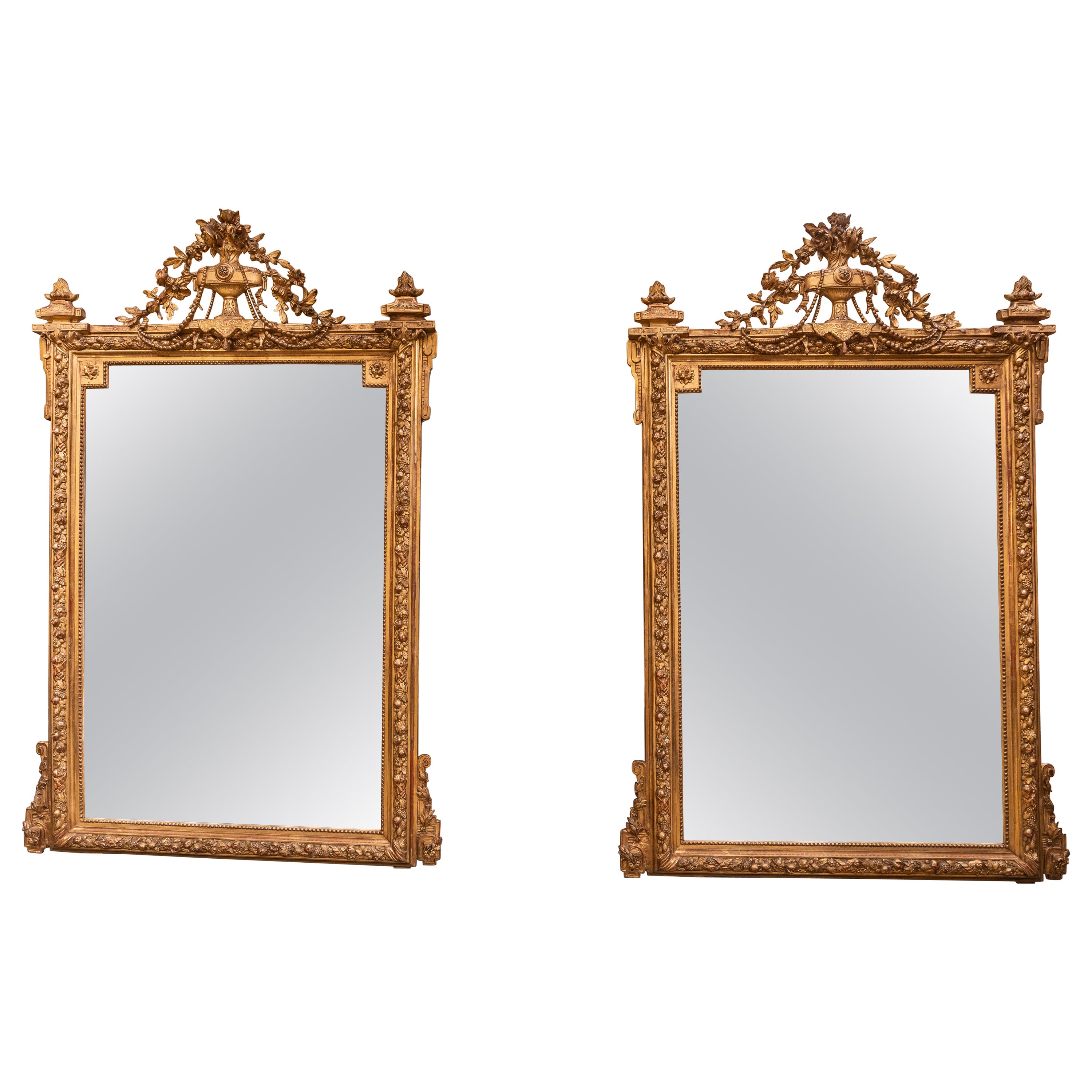 A fine pair of 19th century French Louis XVI carved and gilt mirrors .  For Sale