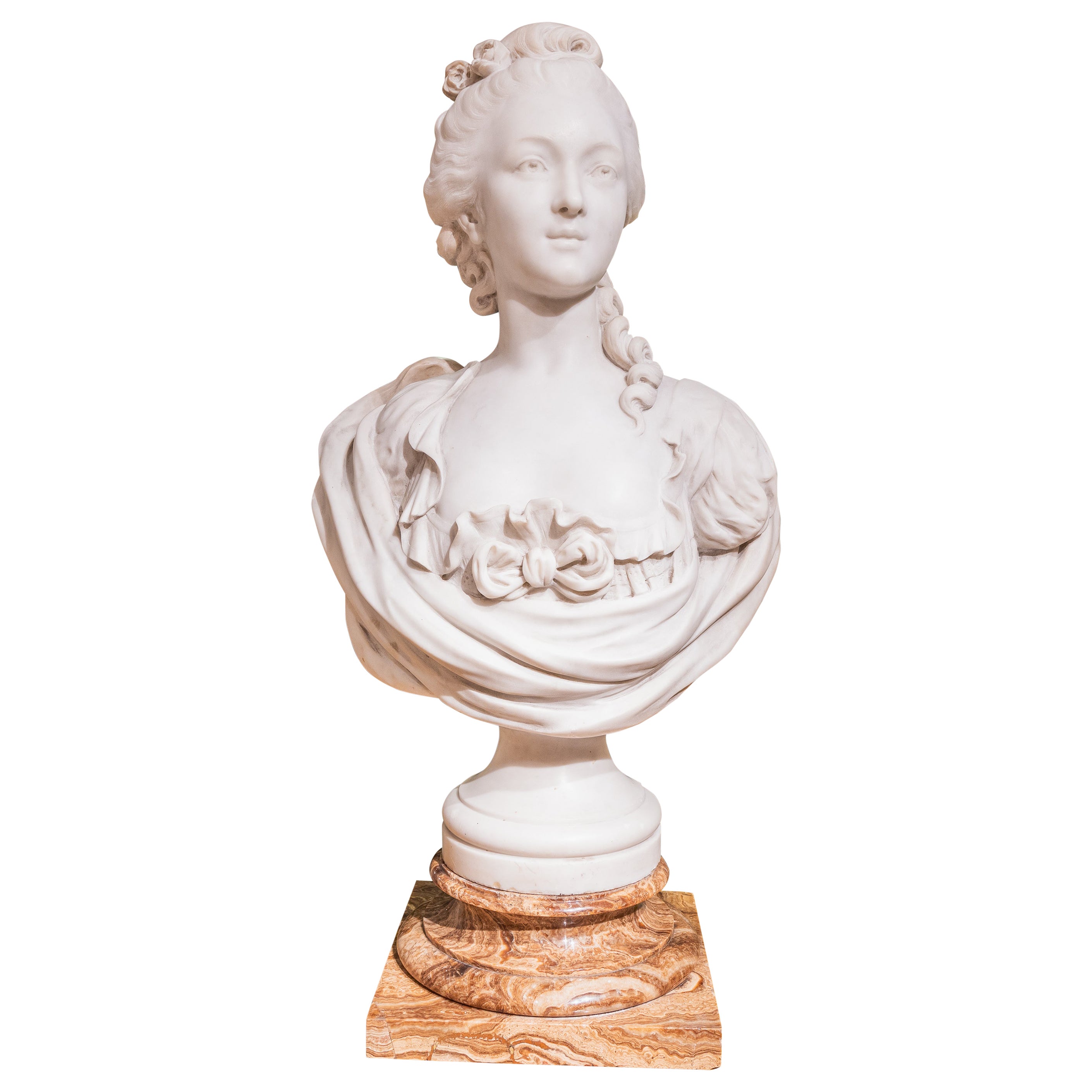 A  19th c Carrara marble bust of Marie Antoinette on an onyx base. Signed E. Vax