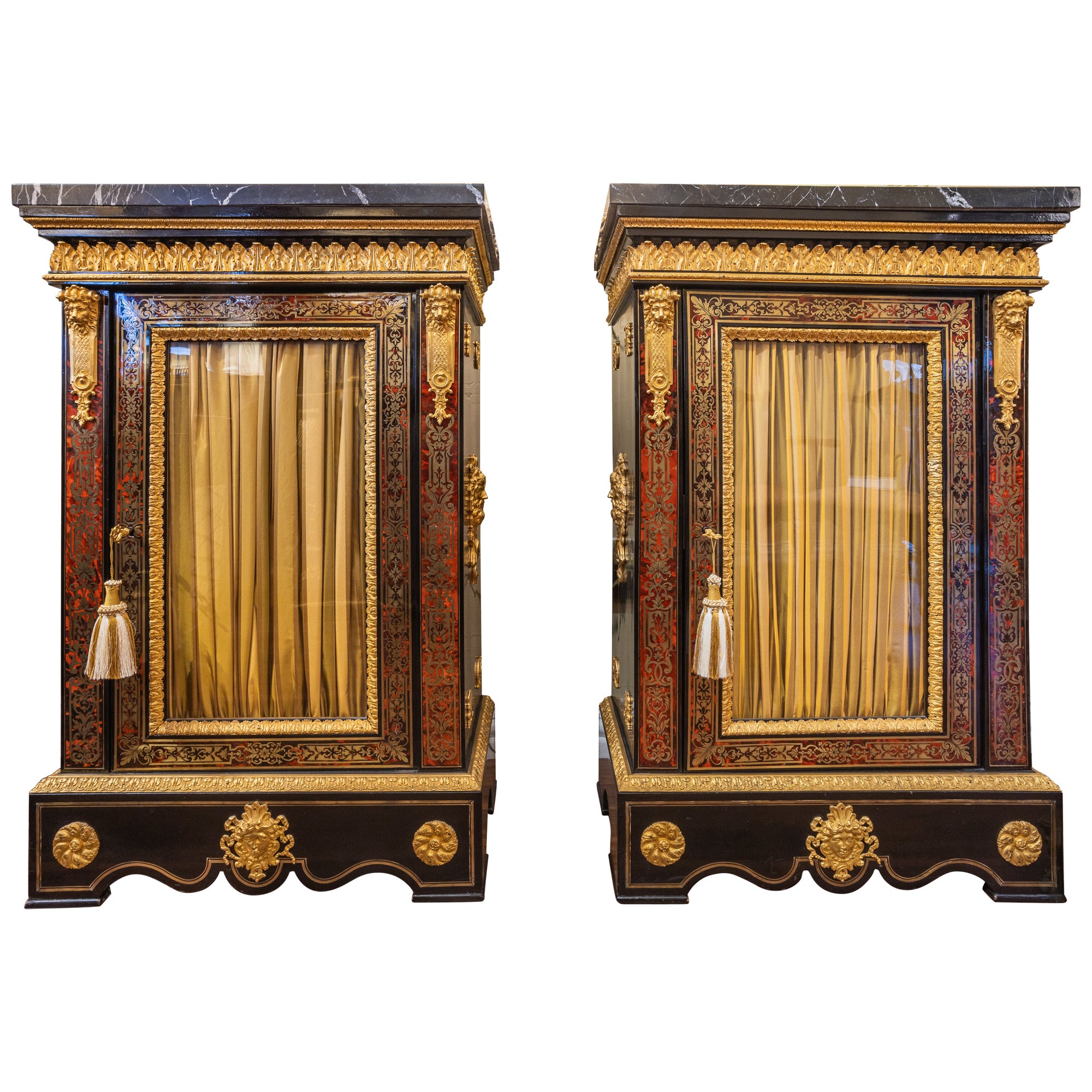 A fine pair of French Boulle and gilt bronze mounted cabinets. Black marble tops For Sale