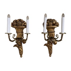 Pair of 19th Century French Louis XVI Carved Giltwood Two-Light Wall Sconces