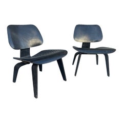 Pair of Charles and Ray Eames, LCW Lounge Chair, circa 1960
