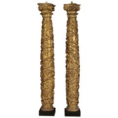 Two 17th Century Turned Gilt and Carved Columns with Corinthian Capitals