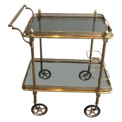 Brass Drinks Trolley with Blueish Glass shelves by Maison Jansen