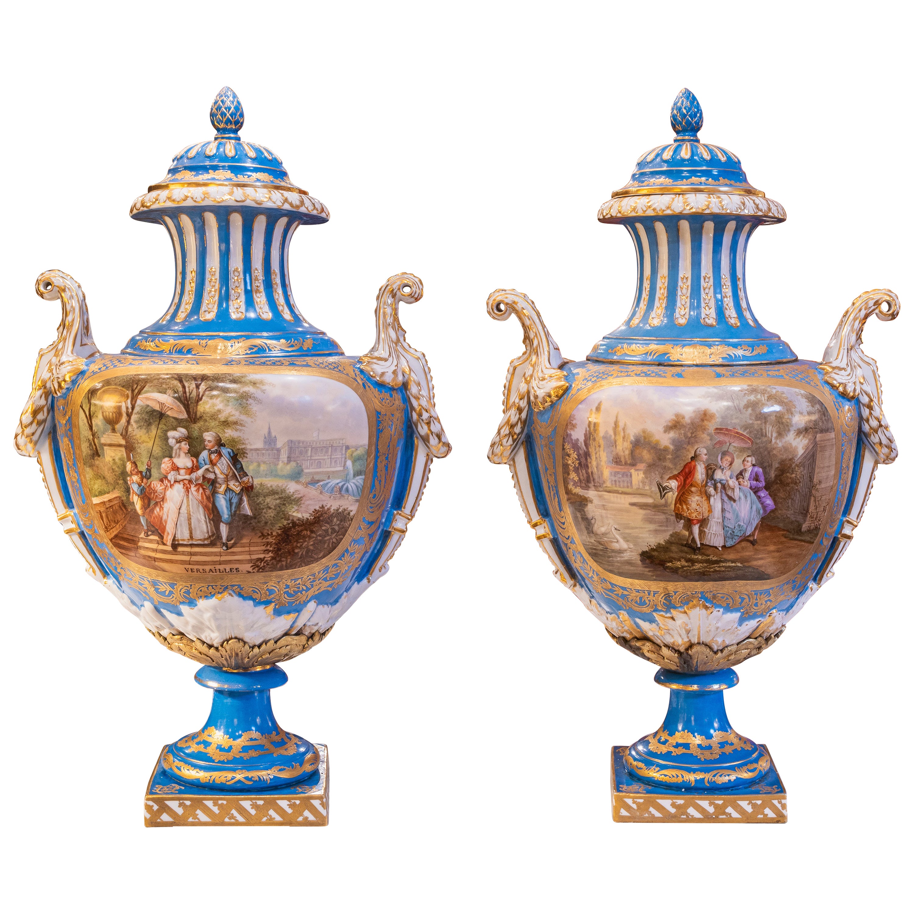 A fine pair of early 20th c  Sevre's style celeste blue palatial porcelain vases