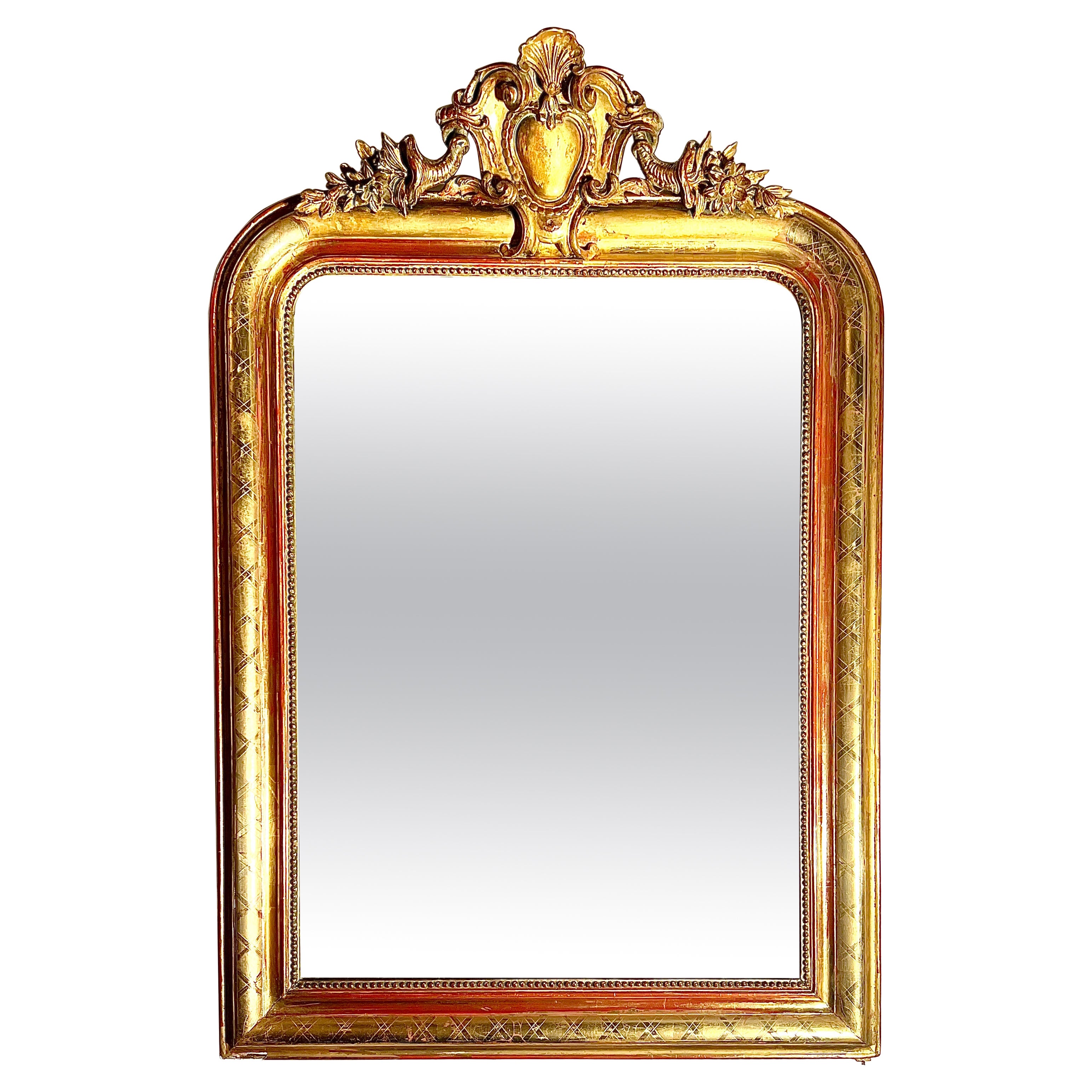 Ancien miroir Louis Philippe en bois sculpté et feuilles d'or, Circa 1890. en vente