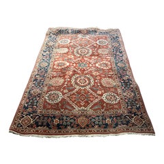 Tapis Agra noué à la main dans des teintes rouille et des tons chauds