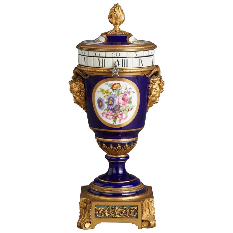 A charming probably Sevres annular dial striking urn clock For Sale