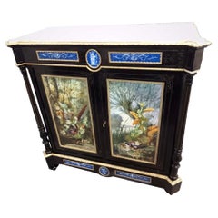 An Exceptional Napoleon III Cabinet with Large Hand Painted Sevres Plaques.