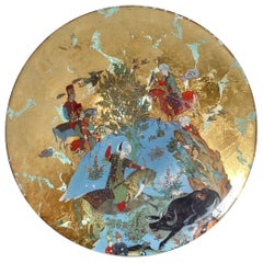 A Hand Painted and gilt Eglomise Glass Bowl Charger 