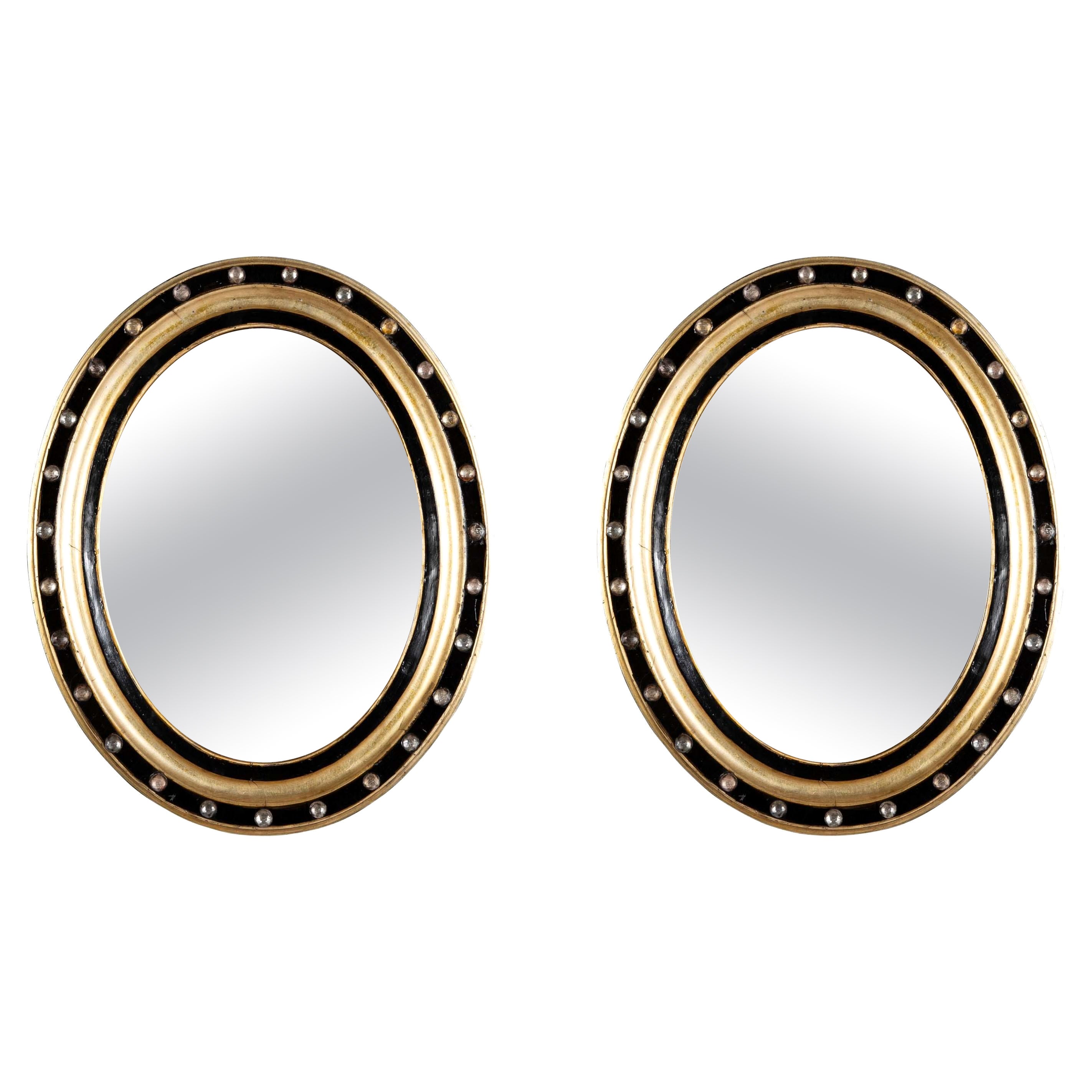 Pair 19th Century Irish Gilt and Ebonized Oval Mirrors With Faceted Crystals For Sale