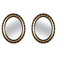 Pair 19th Century Irish Gilt and Ebonized Oval Mirrors With Faceted Crystals