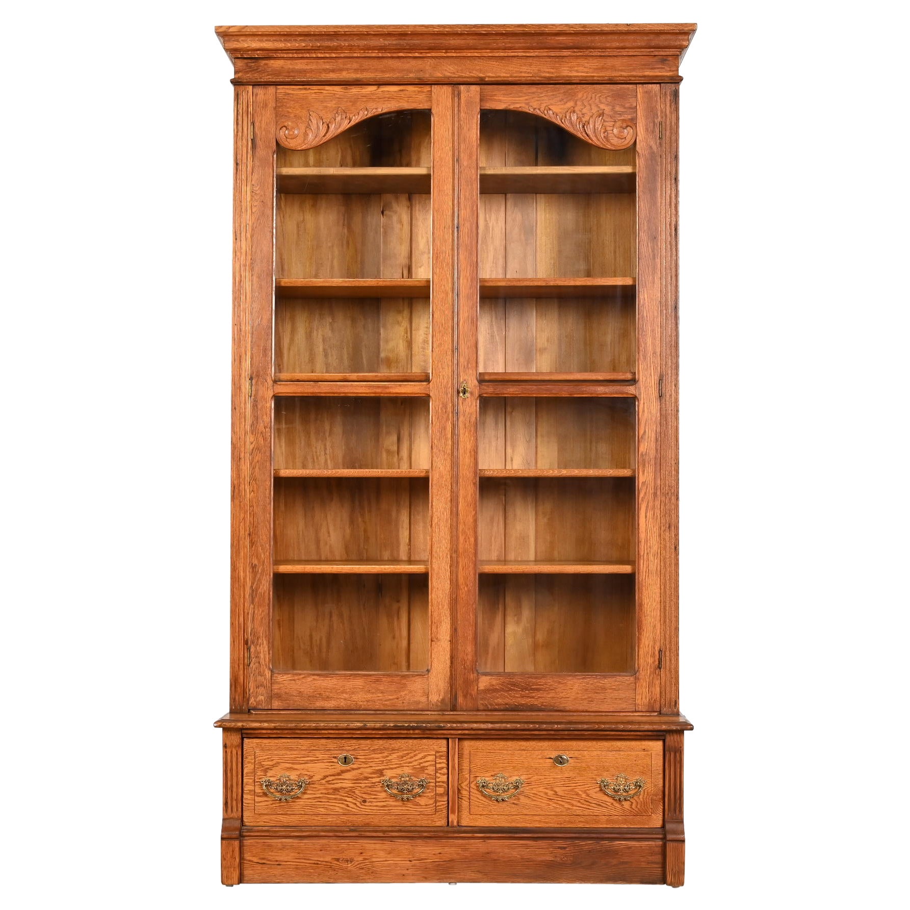 Antique Victorian Carved Oak Glass Front Bookcase, Circa 1900 For Sale