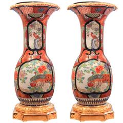 Antique Pair of Japanese Kutani Urns on Gilt Bronze Pedestals