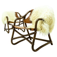 Retro sheepskin and leather and cane easy chairs attributed to Rohe Noordwolde