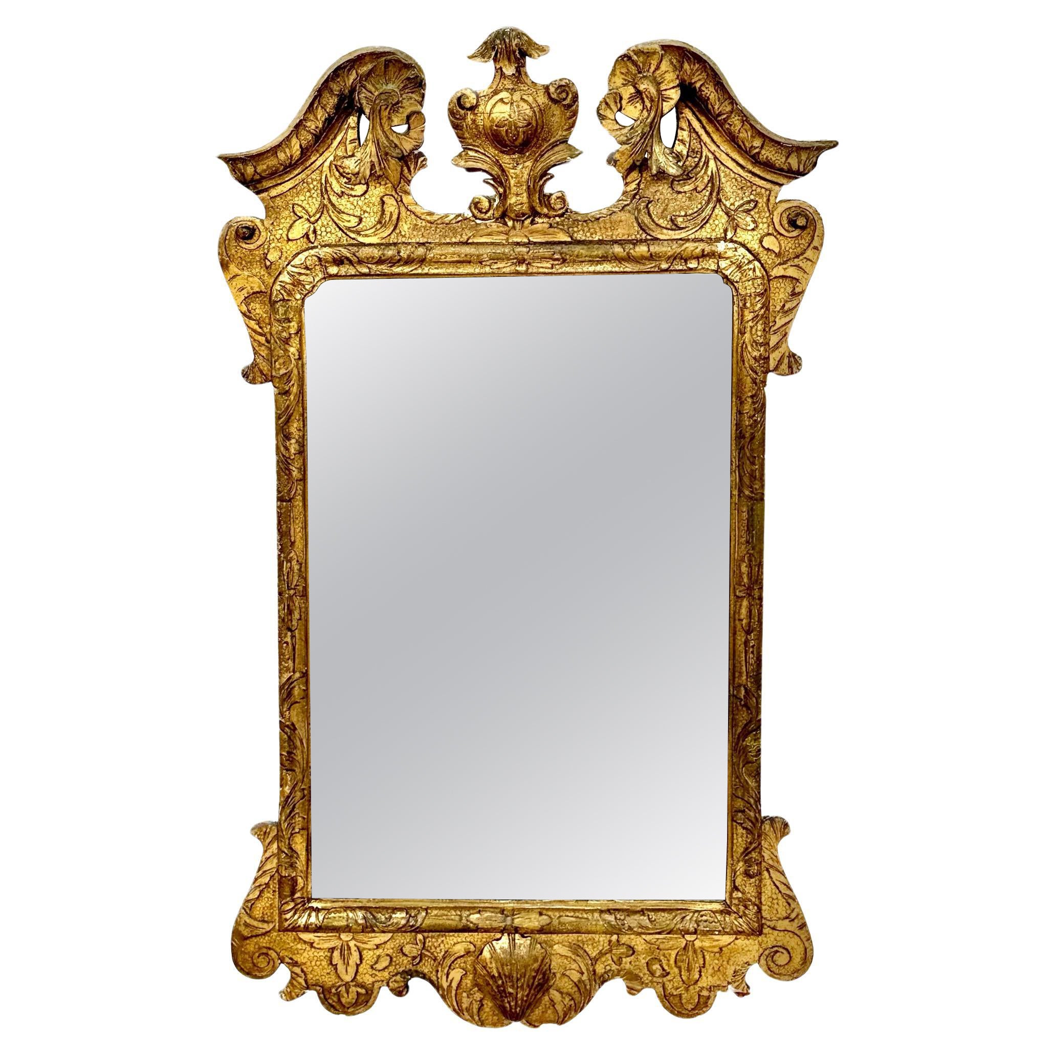 Miroir encadré en bois doré George II
