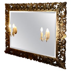 Grand miroir trumeau gothique français doré avec appliques jumelles   