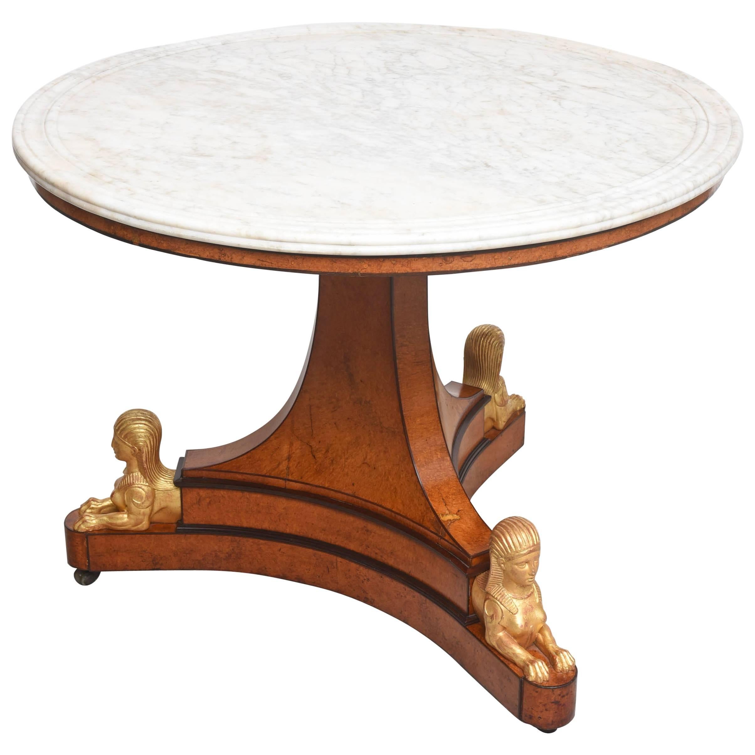 Table centrale Charles X avec sphinx en vente