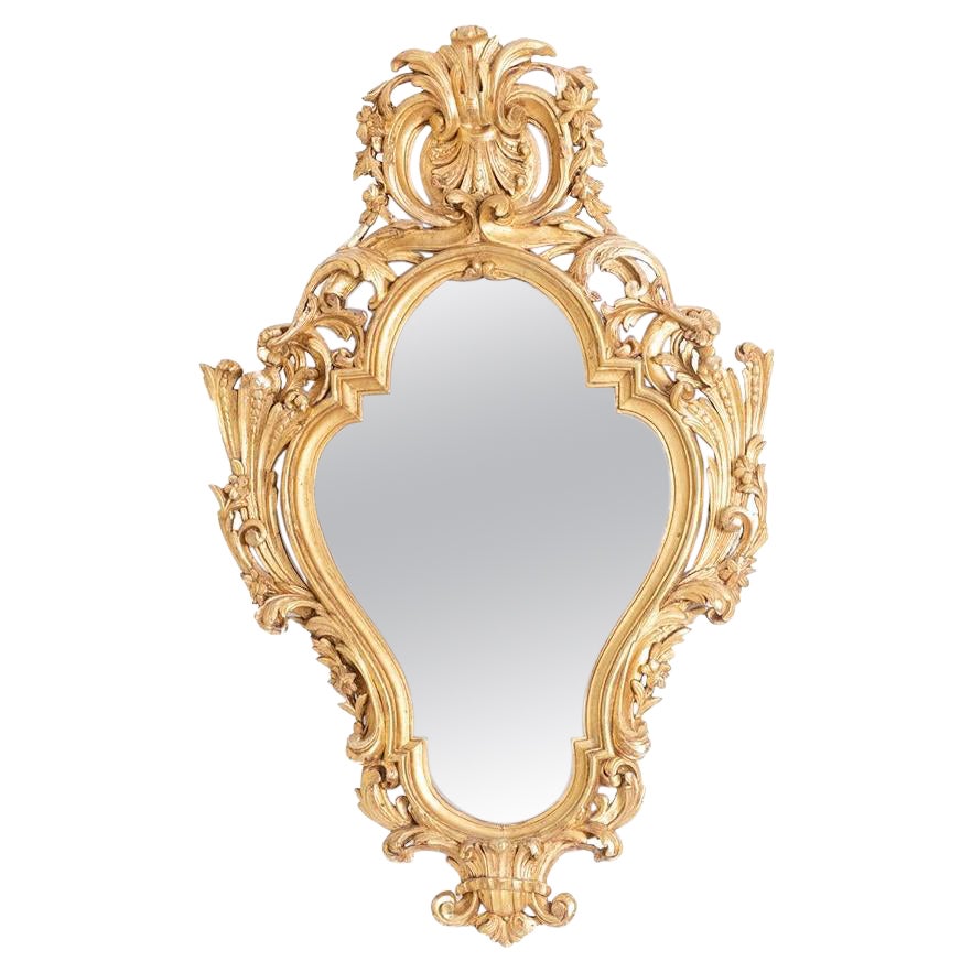 Regency style mirror in carved and gilded wood. 1950s. For Sale