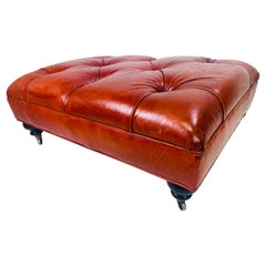 Retro English traditional style tufted leather ottoman.