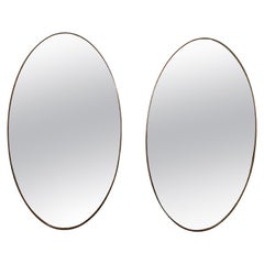 Vintage Pair of Italian Modernist Brass Oval Grand Scale Wall Mirrors, Italy, circa 1950
