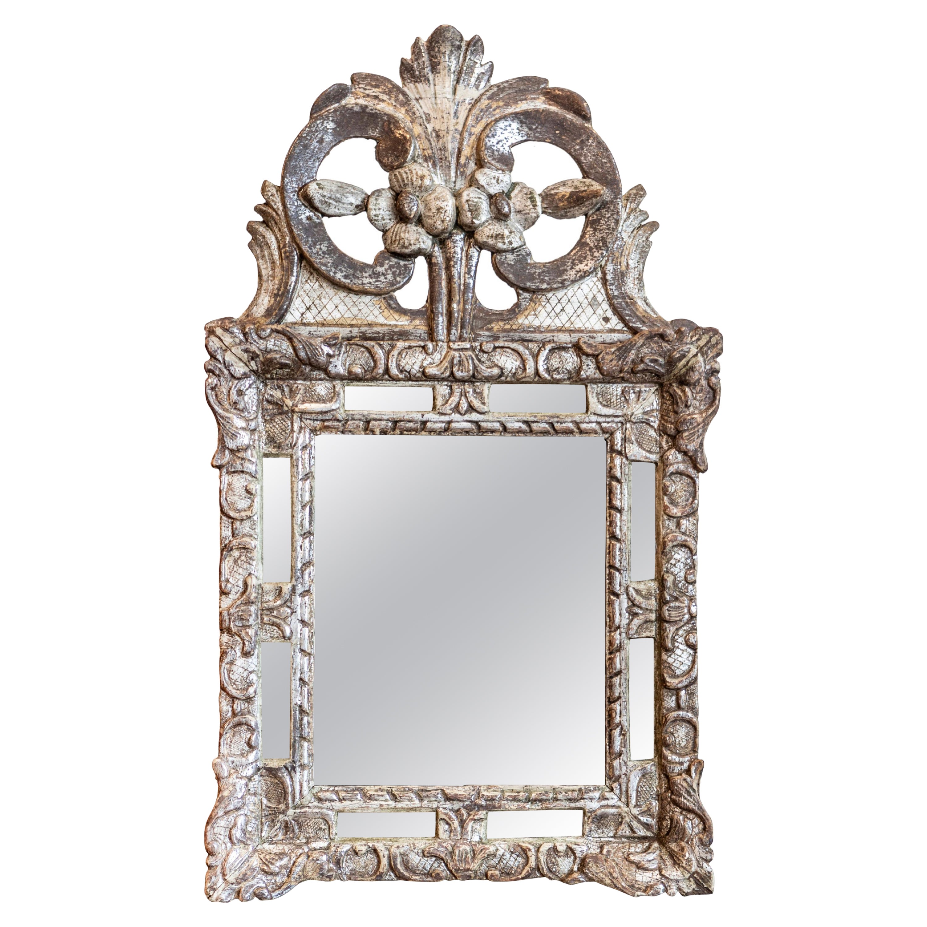 Régence 18th Century French Silver Parcel Gilt Mirror with Floral Carved Crest For Sale