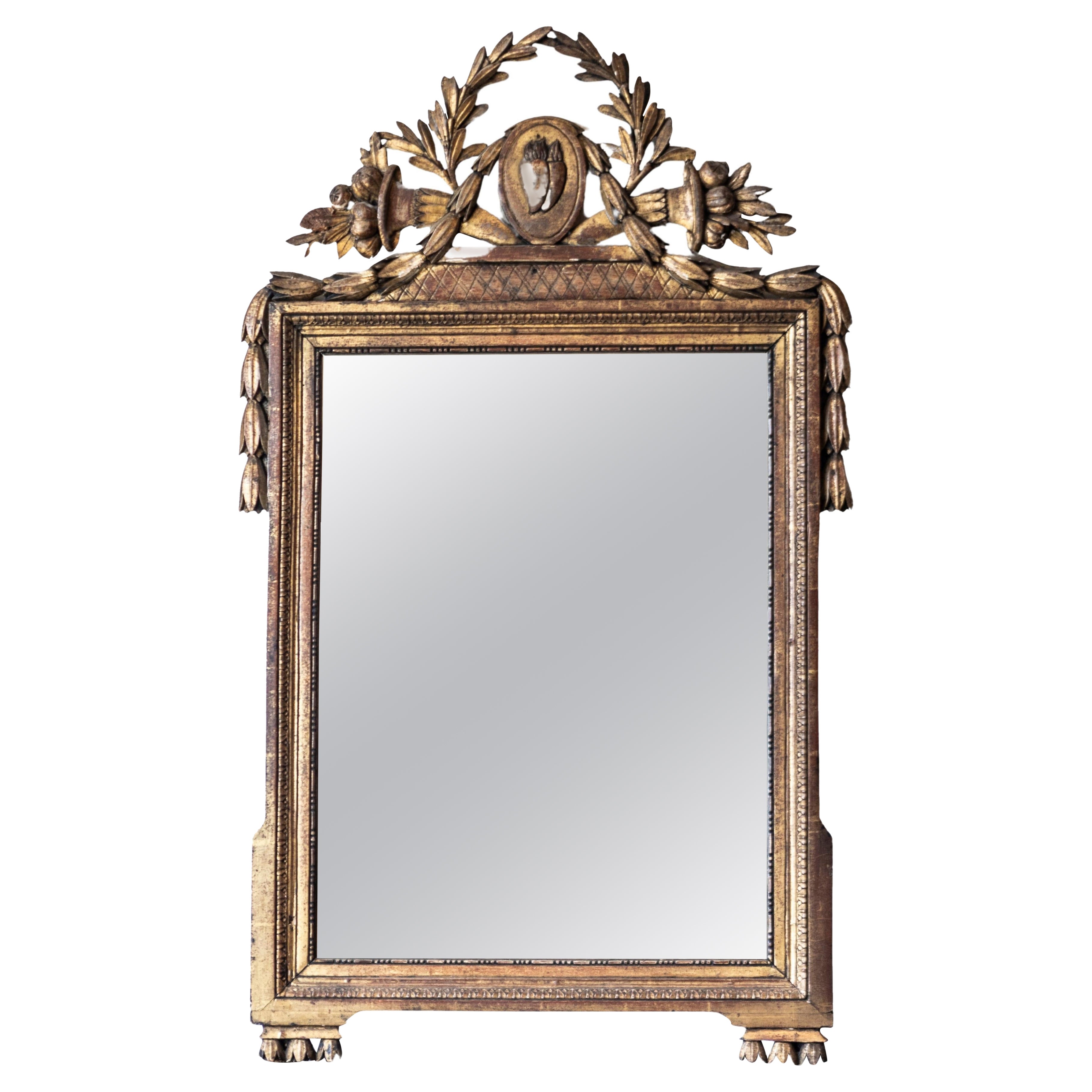 French Louis XVI Period 18th Century Giltwood Mirror with Carved Hearts on Fire For Sale