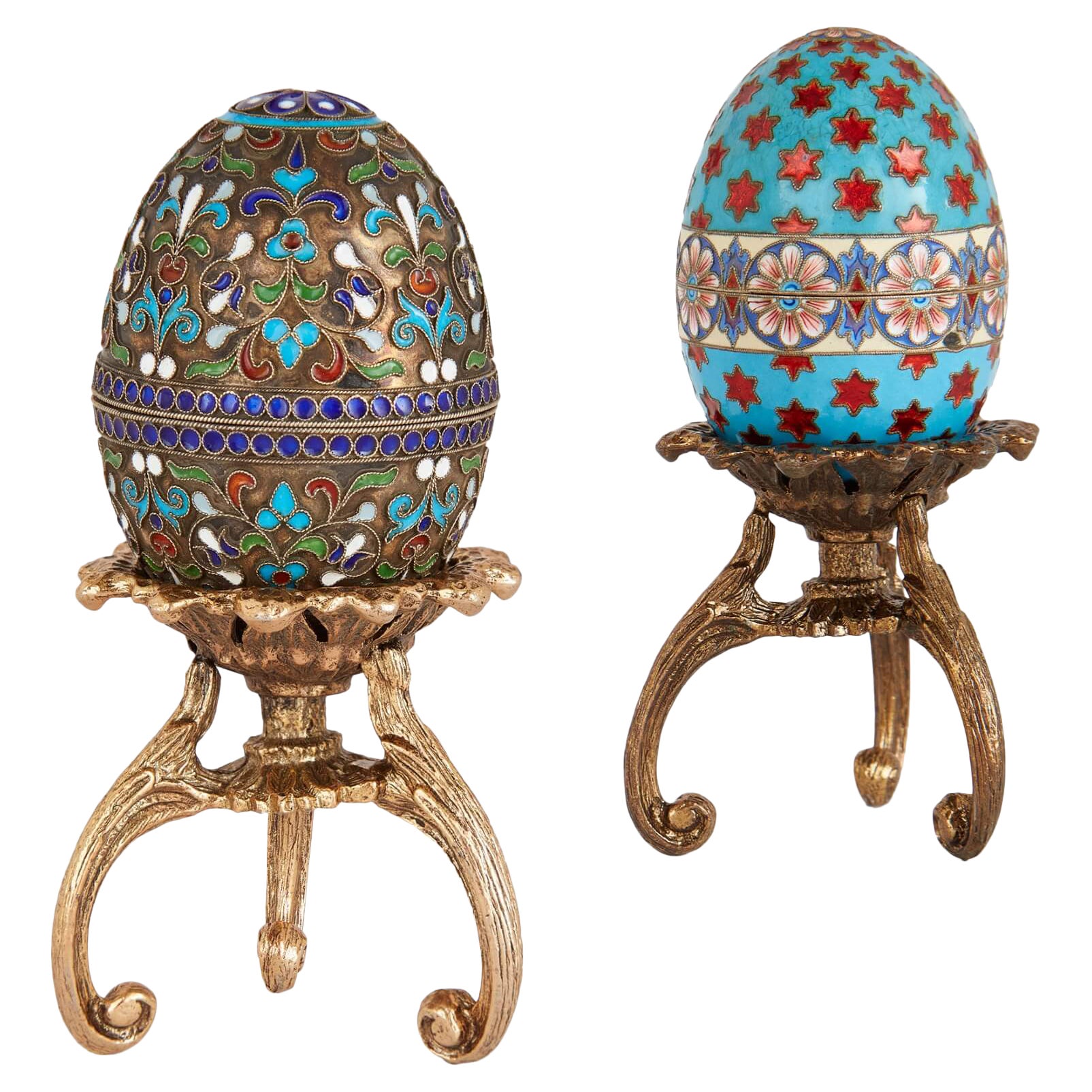 Two Russian Silver Gilt and Cloisonné Enamel Eggs on Stands 