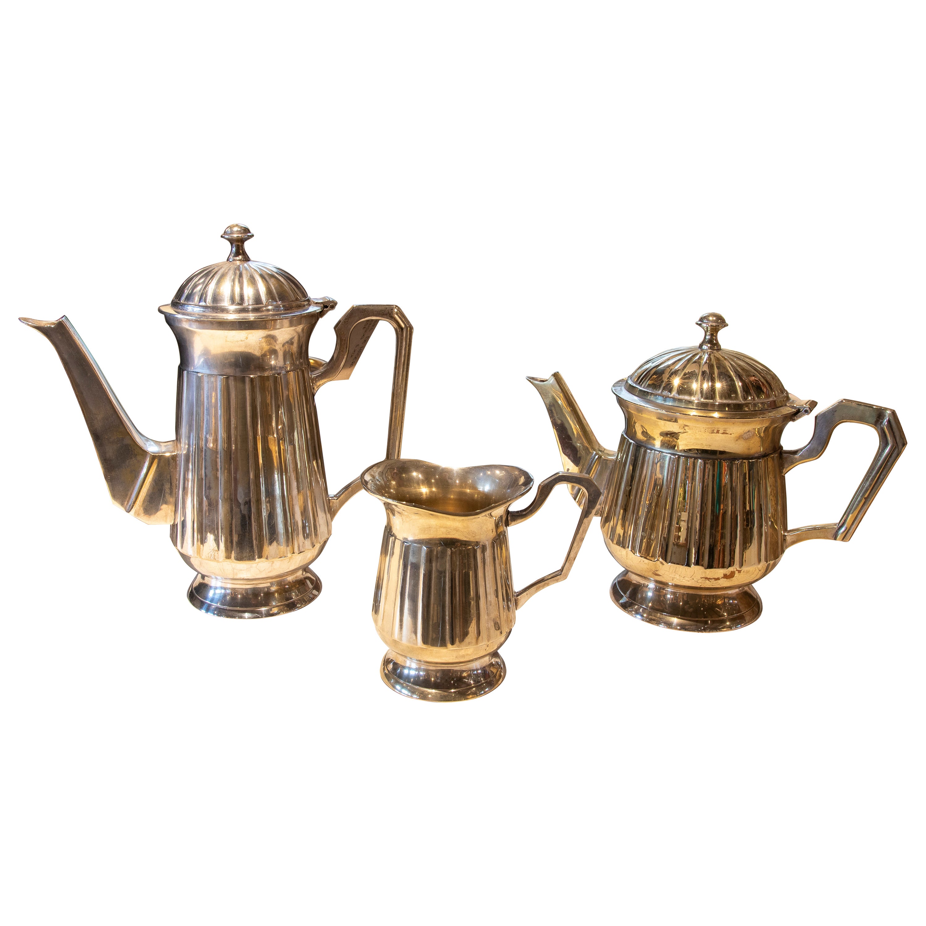 Set Consisting of Three Silver Plated Metal Coffee and Milk Jugs For Sale