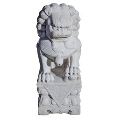 Chinese Marble Foo Dog Resting on Squared Decorative Plinth, 20th Century