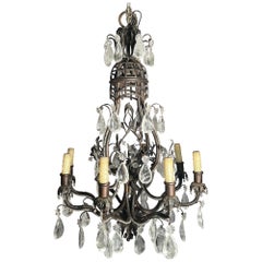 Used 19th Century French Wrought Iron Chandelier with Rock Crystal Prisms.