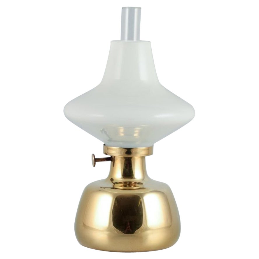 Henning Koppel for Louis Poulsen. Petronella oil lamp in brass and opal glass For Sale