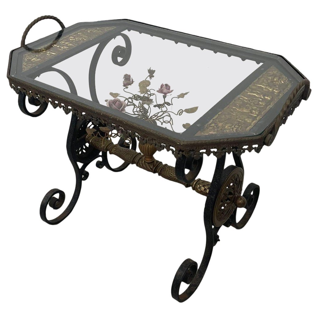 Vintage Wrought Iron Side Table With Ornate Detailing and Glass Top. For Sale