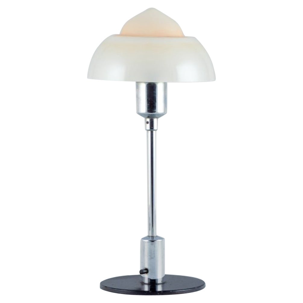 Fog & Mørup. Table lamp with a "Spejlæg"(Fried Egg) glass shade.
