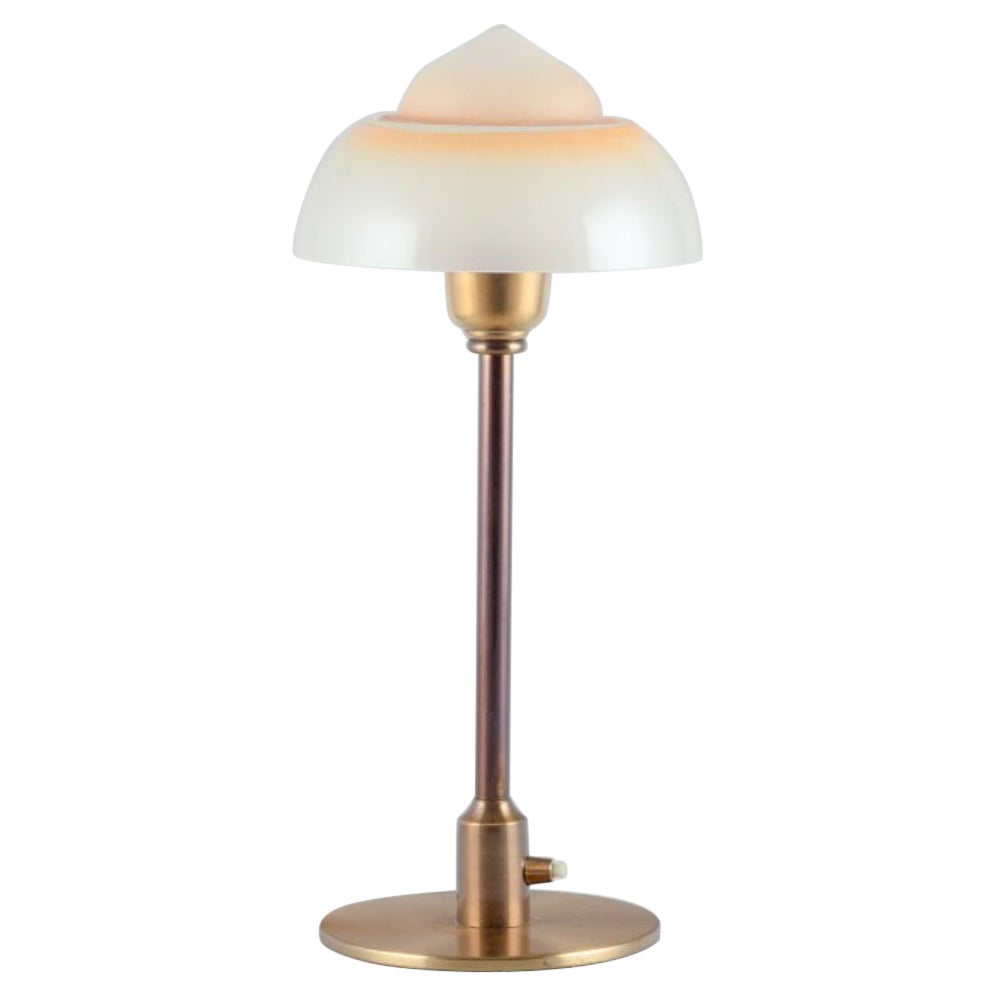 Fog & Mørup. Table lamp with stem in patinated brass and 'Fried Egg' glass shade For Sale
