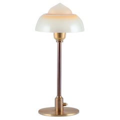 Fog & Mørup. Table lamp with stem in patinated brass and 'Fried Egg' glass shade