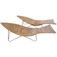 Vintage Pair of Wicker or Cane and Iron Fish Shaped Outdoor or Patio Chaise Lounges
