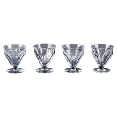 Vintage Baccarat, France. Set of four Art Deco white wine glasses in crystal glass.