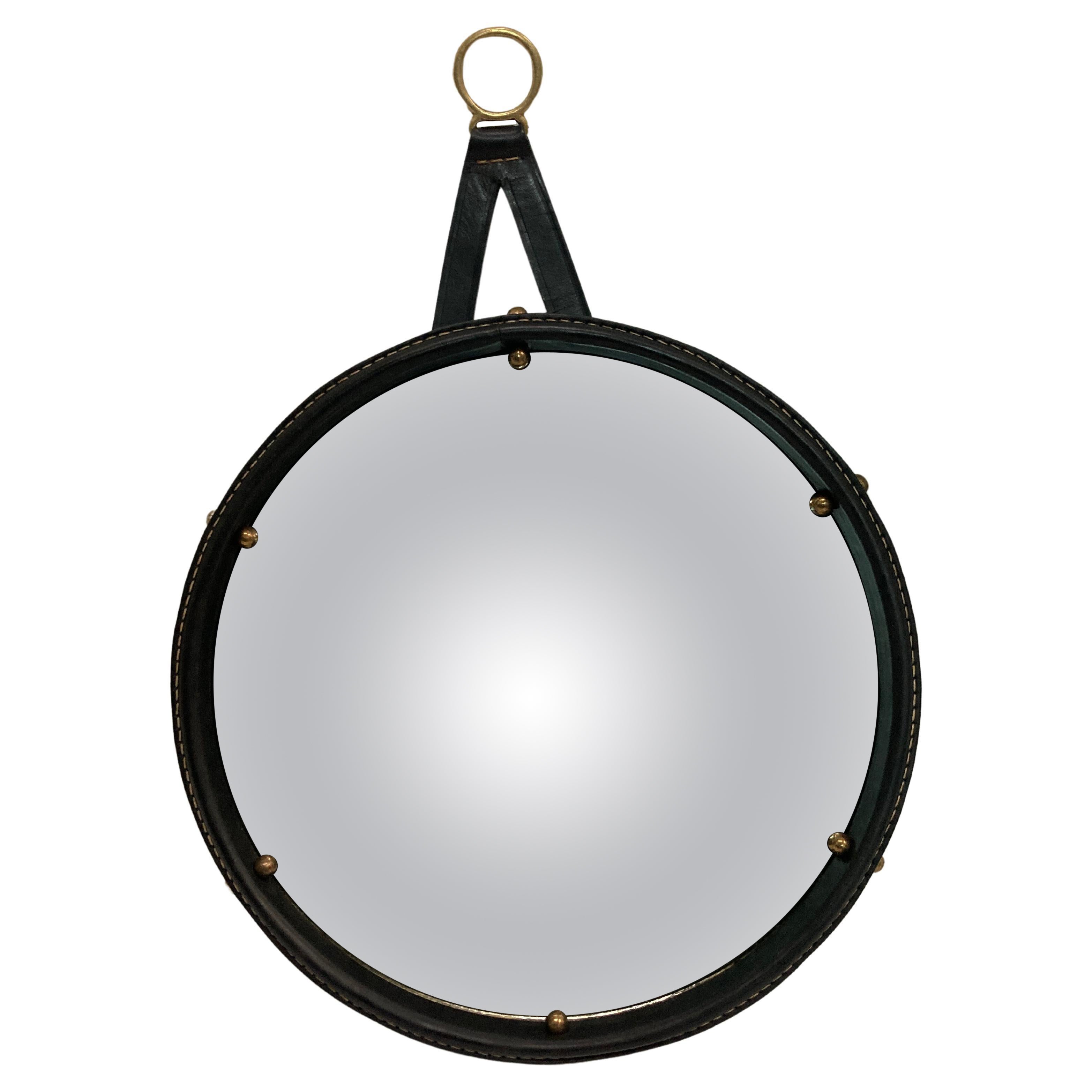 1950's Stitched leather " witch " mirror by Jacques Adnet For Sale