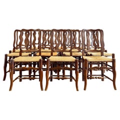 Set of Fourteen Early Twentieth Century French Vernacular Dining Chairs