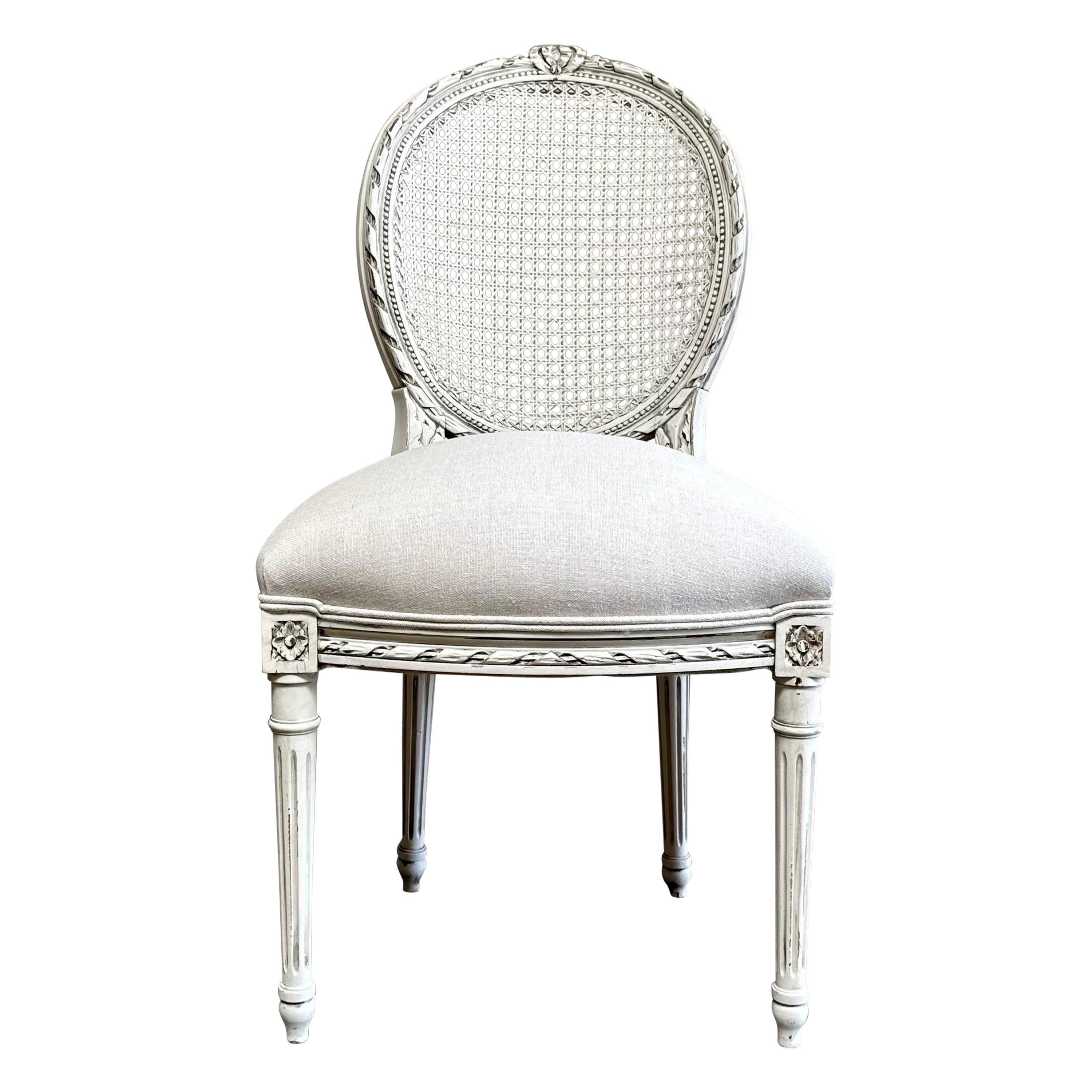 Antique Louis XVI Style French cane back chair in Oyster White Finish For Sale