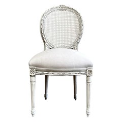 Antique Louis XVI Style French cane back chair in Oyster White Finish