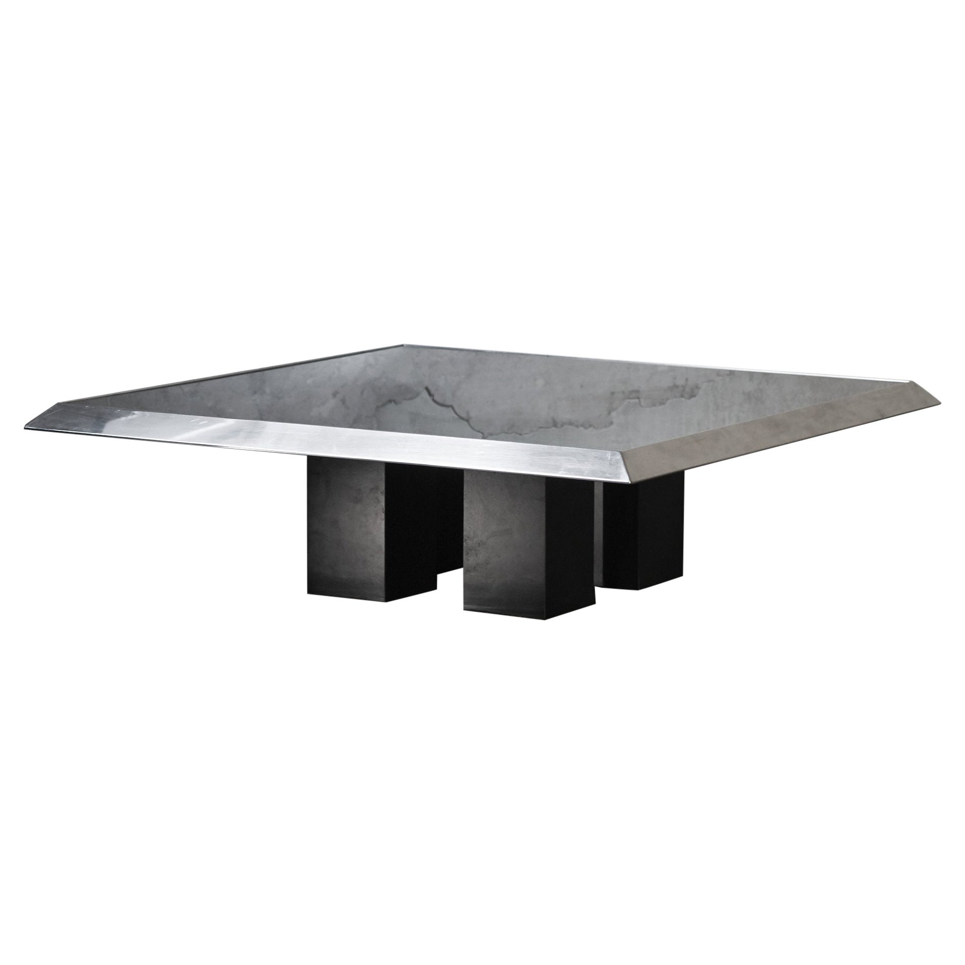 Coffee table in chromed metal, black glass top and black lacquered wooden feet